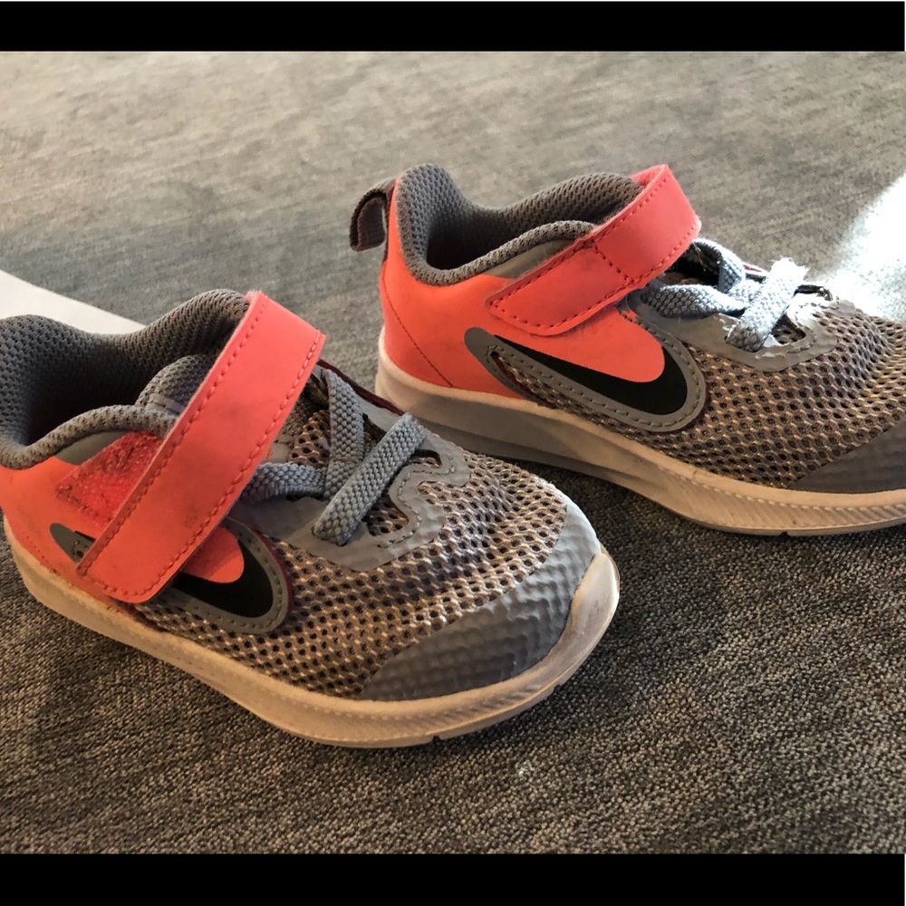 Grey and pink nikes size 5C GUC